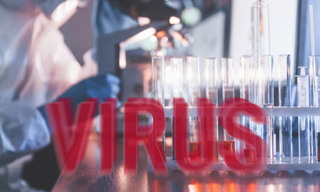 Red virus word. Scientist in protective uniform working with virus indoors in lab with test tubes and microscopeの写真素材