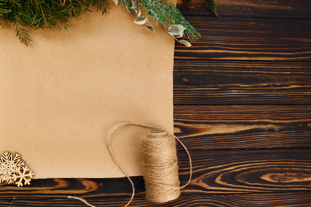 Yellow paper. Top view of christmas festive texture with new year decorationsの写真素材