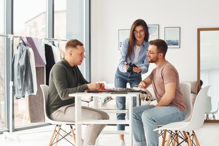 Cheerful workers. Group of people togethe in the officeの写真素材