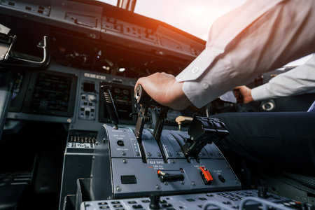 Control of the flight. Pilot on the work in the passenger airplane. Preparing for takeoffの写真素材