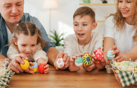 Happy family celebrating Easter holidays together.