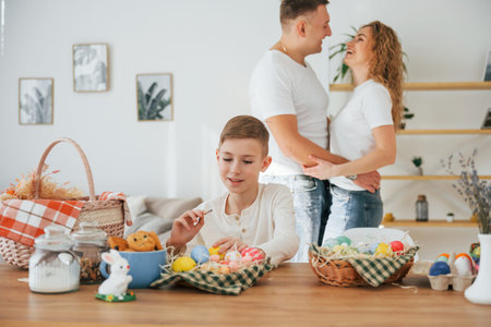 Happy family celebrating Easter holidays together.