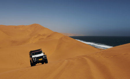 Car in the deserts of Africa, Namibia.