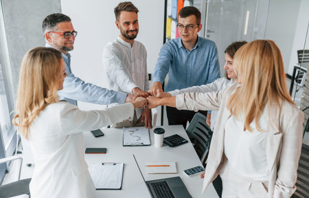 Successful teamwork. Group of professional business people is in the office.