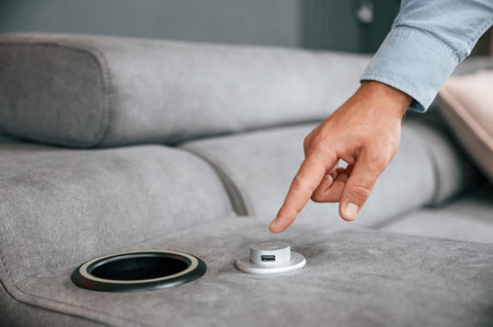 Trying automatic switches. Customer visiting the sofa and bed store. Looking for update.