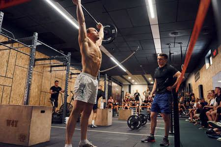 Ternopil, Ukraine - August 20, 2022: Sportive competition in the gym. Lifting barbell.のeditorial素材
