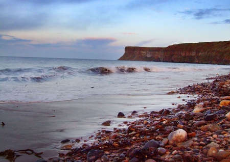 seaside at dusk.の写真素材
