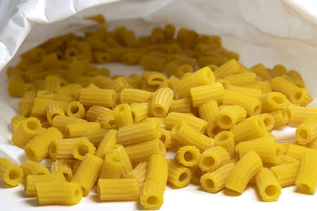 Handmade Italian macaroni pasta with egg and flourの写真素材