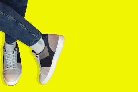 relaxing boy with crossed legsの写真素材