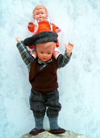 Little doll boy with girl dollの写真素材