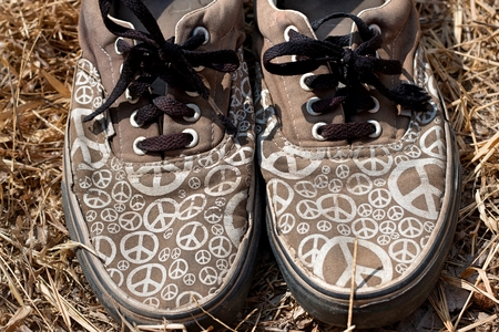 People put their feet on the canvas on a park street.の写真素材