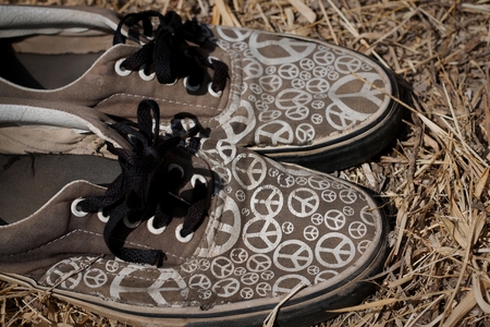 People put their feet on the canvas on a park street.の写真素材