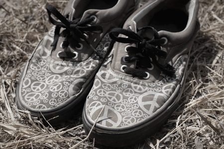 People put their feet on the canvas on a park street.の写真素材