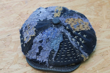 Japanese way of using cloth to embroidery. The old rattling cracked. The art of matching denim with cotton that is indigo mainly as a bag, shoes, hat.の写真素材