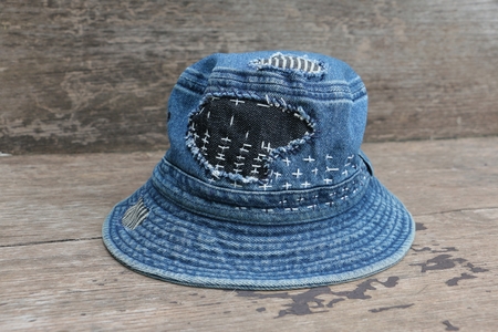 Japanese way of using cloth to embroidery. The old rattling cracked. The art of matching denim with cotton that is indigo mainly as a bag, shoes, hat.の写真素材