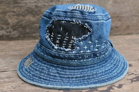 Japanese way of using cloth to embroidery. The old rattling cracked. The art of matching denim with cotton that is indigo mainly as a bag, shoes, hat.の写真素材
