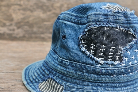 Japanese way of using cloth to embroidery. The old rattling cracked. The art of matching denim with cotton that is indigo mainly as a bag, shoes, hat.の写真素材