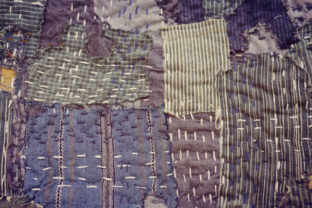 Japanese way of using cloth to embroidery. The old rattling cracked. The art of matching denim with cotton that is indigo mainly as a bag, shoes, hat.の写真素材