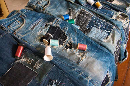 Old fashioned jeans are made to look good in fashion, whether it is sewn to cut a beautiful modern.の写真素材