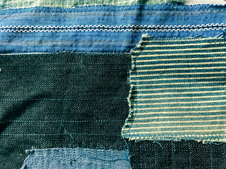 Old jeans lack dyed cotton blue indigo blue. The blue is sewn to form a perfect fit. Boro Japanese styleの写真素材