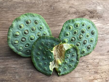 Lotus seed is a green bean plant with white seeds on the Asian side. The river is commonly used for cooking medicine.の写真素材