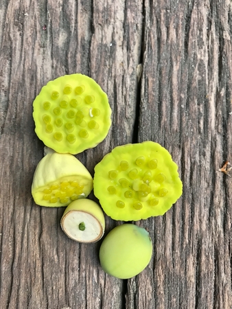 Lotus seed is a green bean plant with white seeds on the Asian side. The river is commonly used for cooking medicine.の写真素材