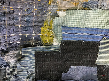 Technicians are doing genes in Japanese style. The work will come out as a tailor cut into a sewing...