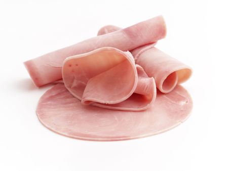 rolled ham isolated on the white backgroundの写真素材