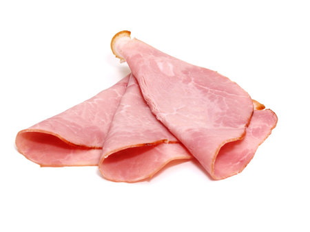 slices of delicious ham isolated on white backgroundの写真素材