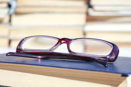 Book and glasses. Education is the path to knowledge and education. The wisdom and concepts of the study.の写真素材