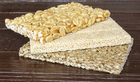 Brittles sesame, sunflower seeds and peanuts closeupの写真素材