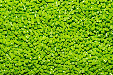 The plastic granules. Polymeric dye green for the background . Dye for plastics in granules .の写真素材