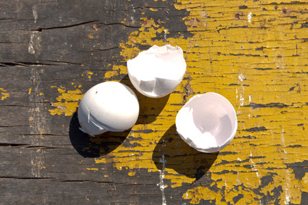 The Pista shell eggs on an old table . The concept of poverty .