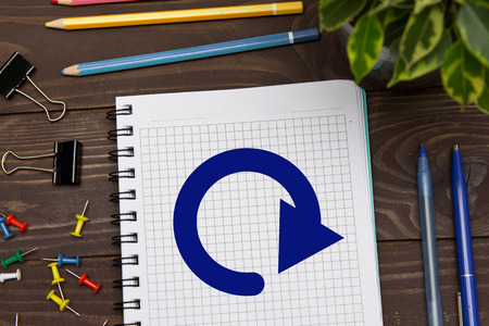 Notebook with a notes renew on the office table with tools. Business conceptの写真素材