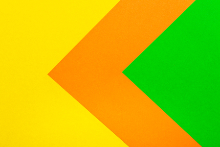 Green orange and yellow color paper texture background. Trend colors, geometric paper background.の写真素材