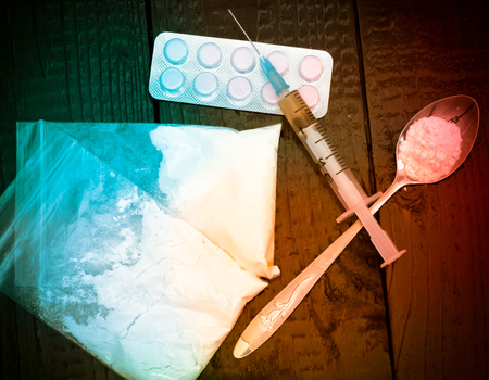 Opioid epidemic . Syringe, spoon, powder, prepared the heroin.の写真素材