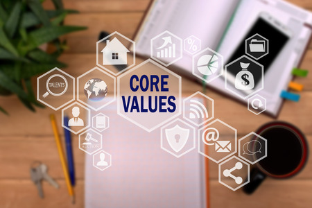 CORE VALUES on the touch screen to the network, on office blur background.Concept of CORE VALUES