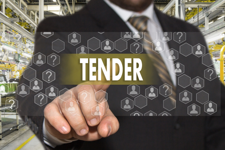 The businessman chooses TENDER on the touch screen with a futuristic background .The concept  TENDER.の写真素材