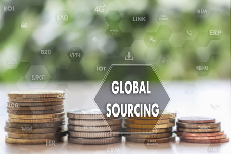 GLOBAL SOURCING  against on the touch screen with a  blur financial background .The concept GLOBAL SOURCINGの写真素材