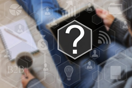 Question on the touch screen with a blur the girl with the gadget, background .The concept of question, searching the networkの写真素材