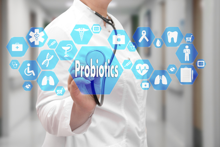 Probiotics on the touch screen with icons on the medicine background blur Doctor in hospital.の写真素材