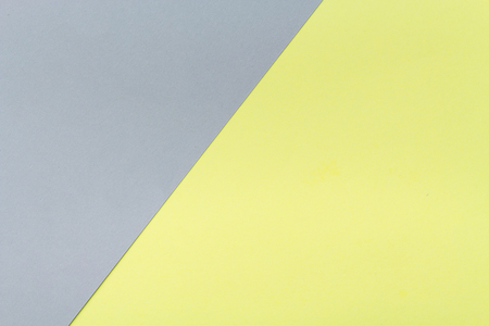 Yellow and grey color cardboard texture background. Trend colors, geometric paper background. Colorful of soft paper background.の写真素材