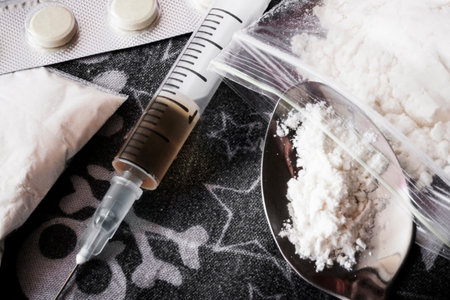 Syringe preparation spoon and prepared the heroin