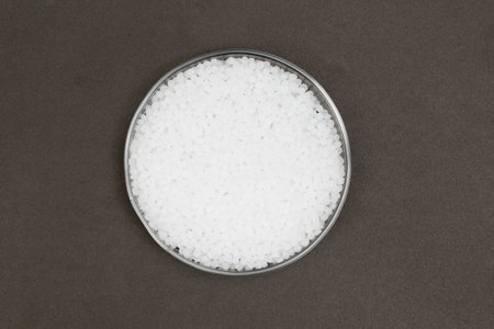 Plastic pellets. Transparent Polyethylene granules. Plastic Raw material  (