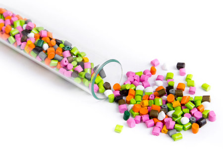 Plastic pallets .Multicolored Plastic granules. Plastic raw materials in granules for industry....