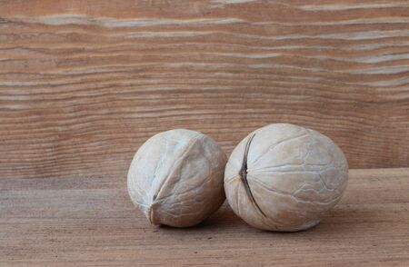 walnuts on a wooden backgroundの写真素材