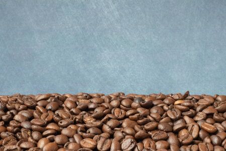 coffee grains located on a beautiful backgroundの写真素材