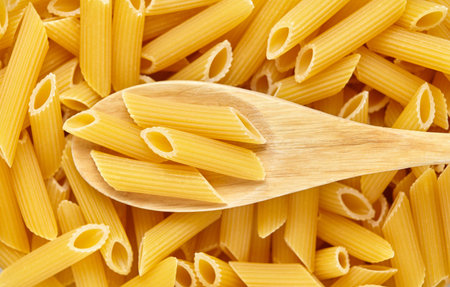 Pasta in a wooden spoon