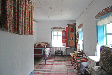 The interior of an old wooden house of a Russian peasant of the late nineteenth centuryのeditorial素材