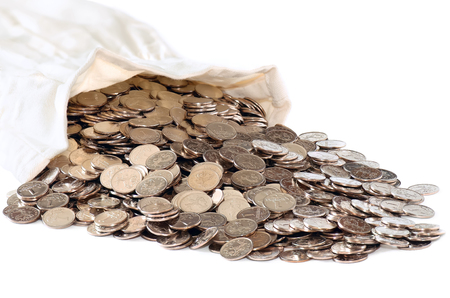 Bag with silver coins isolated on white backgroundの写真素材